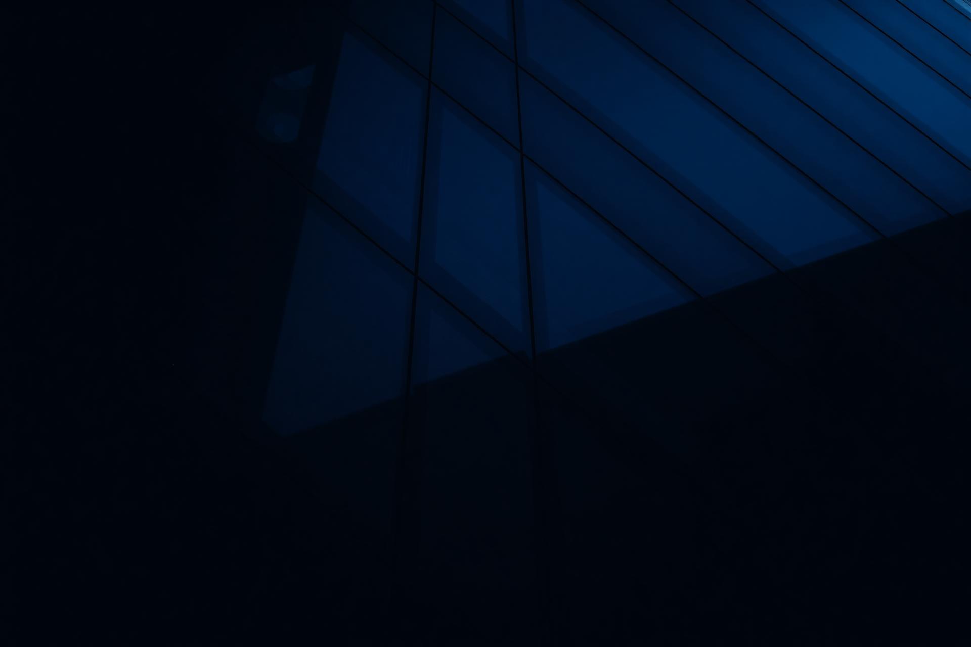 Dark glass facade representing enterprise-grade security